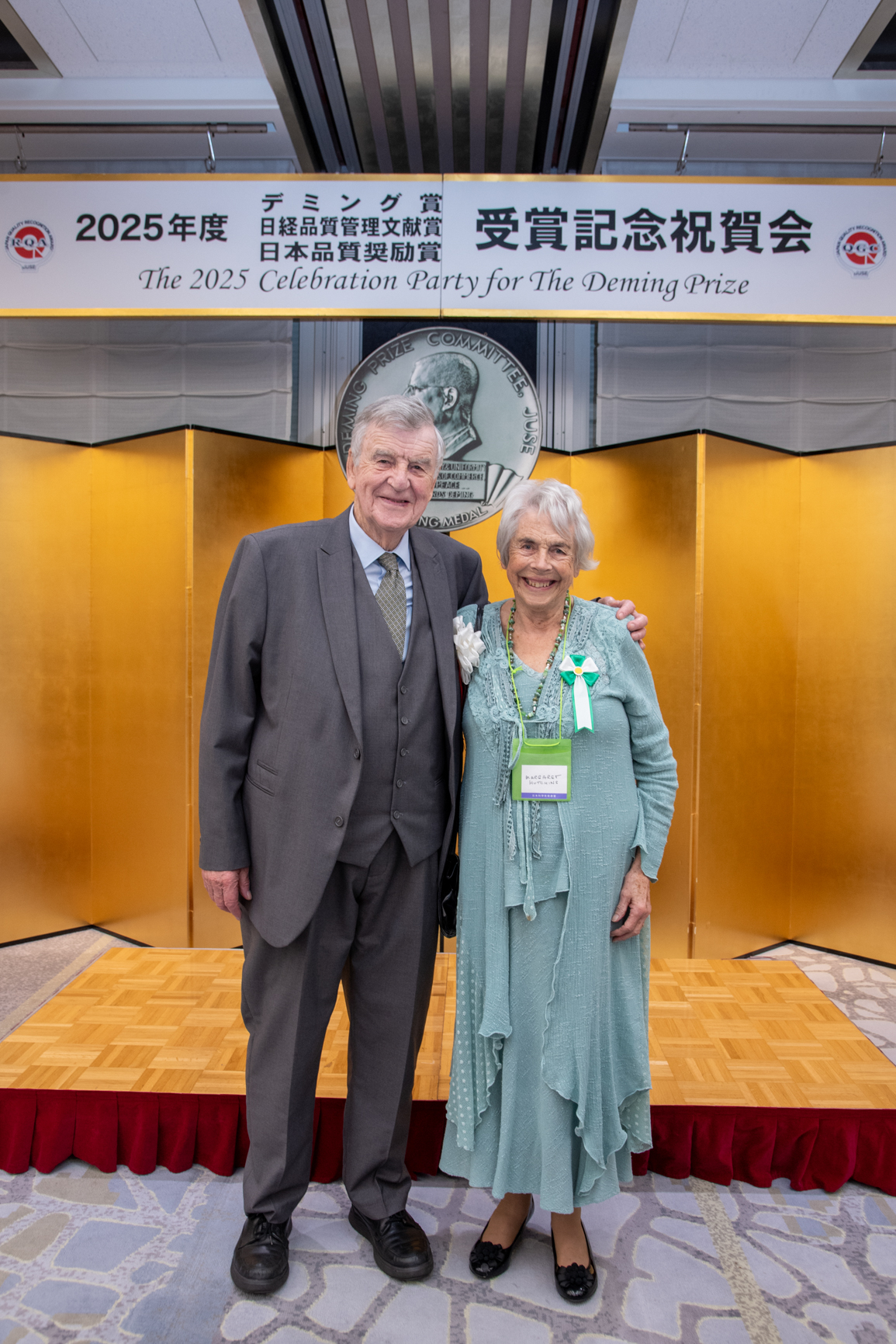 David and Margaret Hutchins in front of the Deming Medal